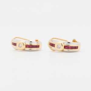 Aros de la marca Duchamp de oro amarillo y blanco de 18K - Imagen 1